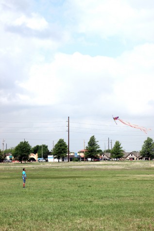 Sophomore Tanner Crum holds onto a colorful kite. 