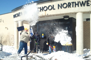 Braving the cold: Custodians endure negative temperatures to clear snow