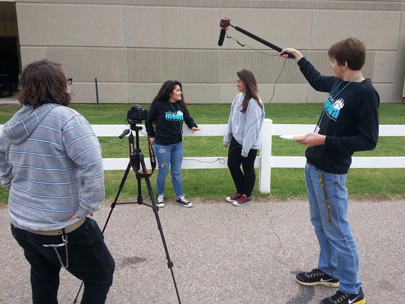 Jordan Coss, Jozabeth Garcia, Tatum Sturdivant and Cody Kretchmar create a video during a journalism competition held at the State Fair in Hutchinson on Sept. 11. 