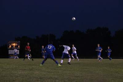 Jesus Morales, Junior, preps  to win the ball.