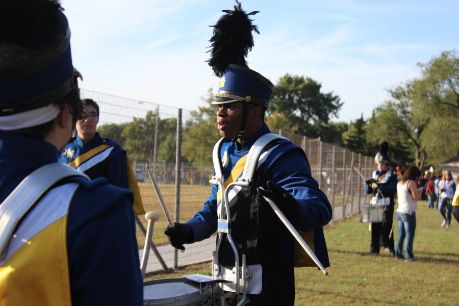 Senior Kole Parker gets the Band hyped up for the parade.