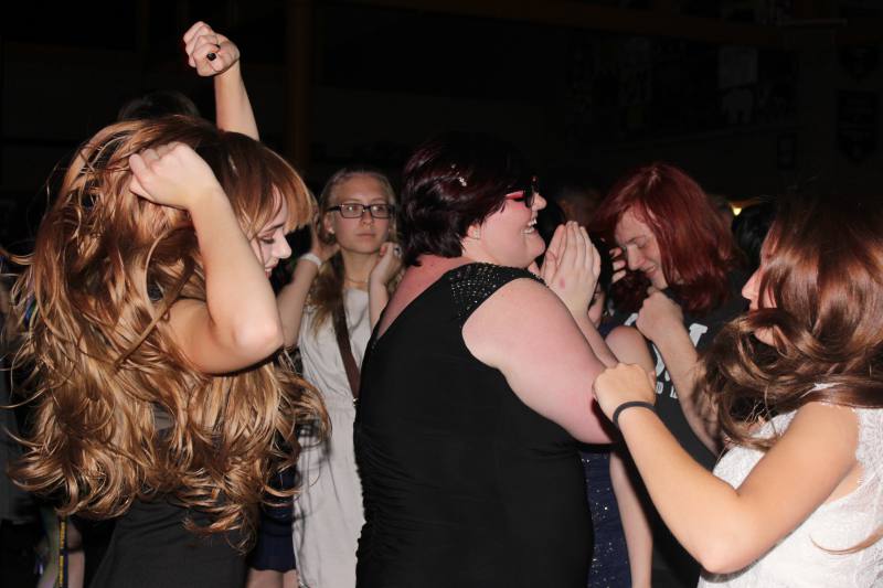 Students seen letting loose and dancing together at homecoming.