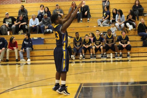 Freshman Jahbreel Rounds shoots a free throw for technical foul called on southeast.