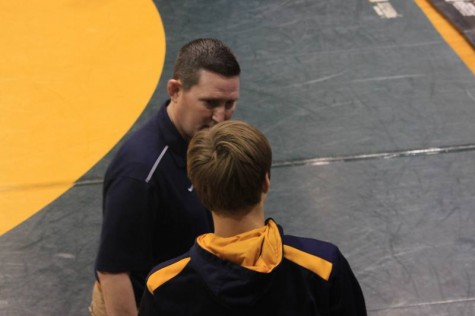 Eric Prichard having a discussion about Junior Tyler Marshall's last match.