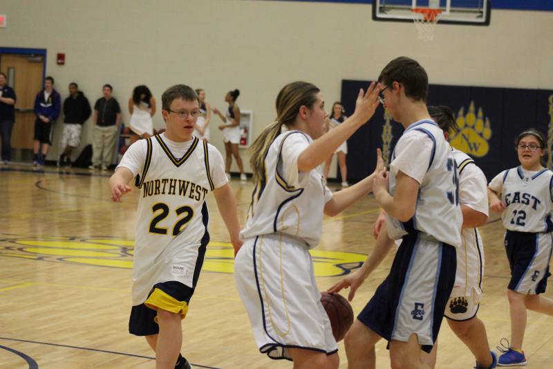 Blake &amp; Shayla try to stop the East player from scoring.