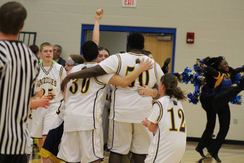 The team celebrates their victory.