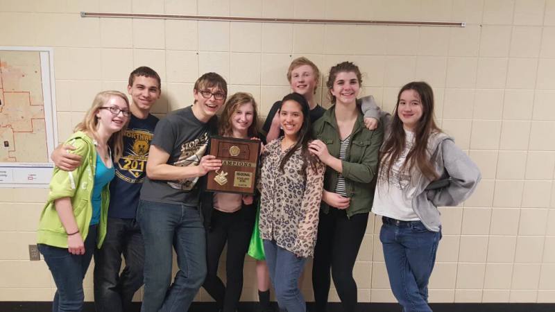 The scholars bowl after winning Regionals. 