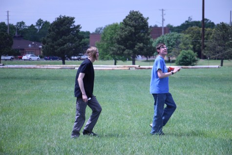 Seniors Jason George and David Hedrick watch their kite climb. 