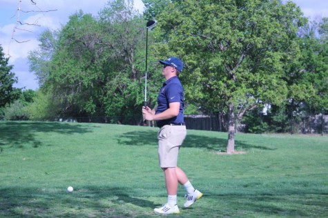 Junior Jacob Devereau looking out to where he hit the ball at MacDonald golf course on Monday, April 25.
