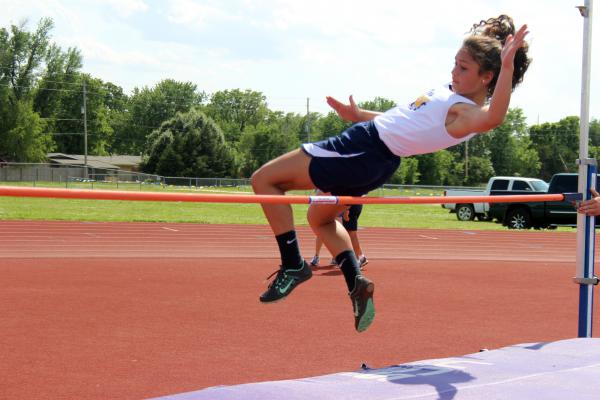 Freshman Ashley Bouddhara practices her high jump at the Northwest track meet.