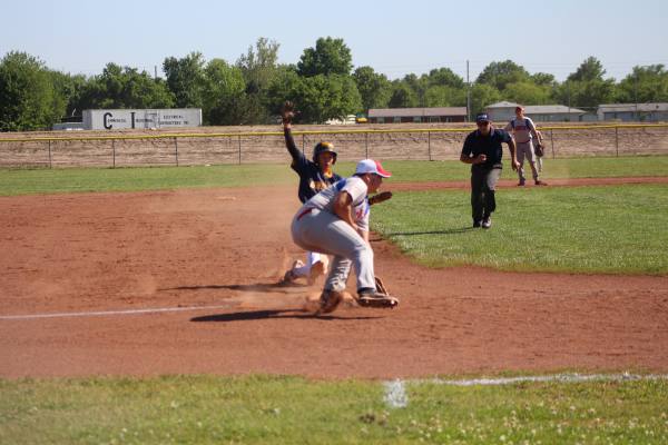 Jace Hanson sliding into 3rd base. SAFE!