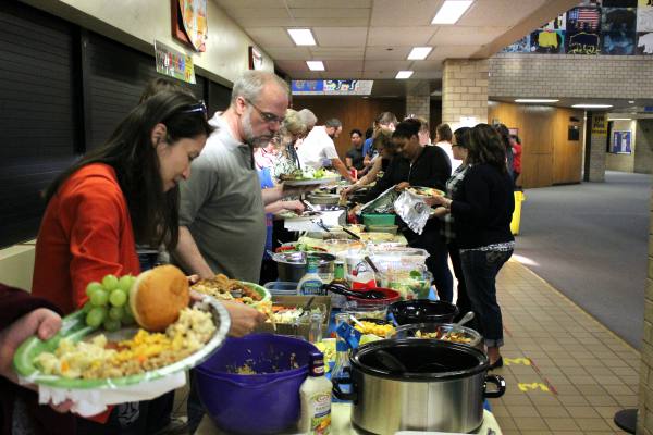 Families get their food at the awards banquet on May 5. The line for food was very long and took over 30 minutes for everyone to get their food.