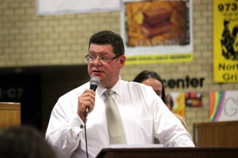 At the music awards banquet host Garry Leopold talks to the families of the orchestra and band students. Leopold announced the awards while band teacher Ms. Wilson handed them out.. "Giving the awards out was my favorite part" Leopold said. 