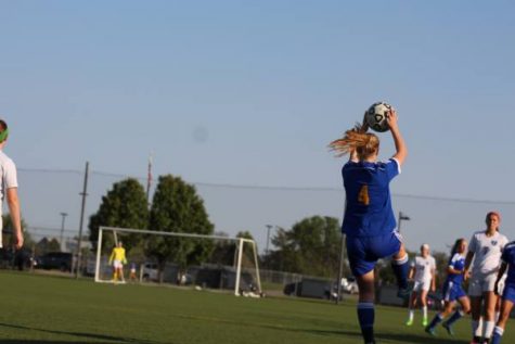 Madison Driskill takes throw-in.