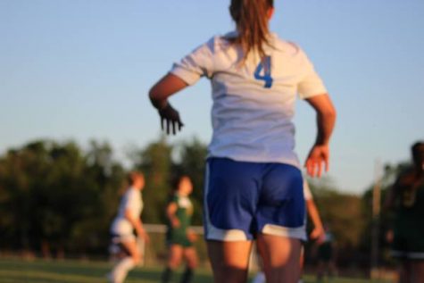 Northwest girls varsity soccer, Madi Driskill (10) takes throw-in.