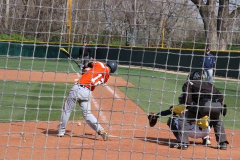 Olathe East batter hits a foul ball off his foot.