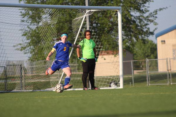 Junior Whitney Weiford takes goal kick. 