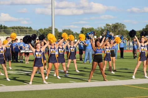 The cheer and dance team combined preforming the "Northwest Fight Song."
