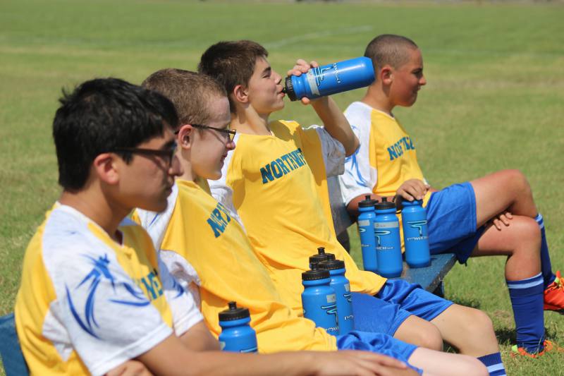 The Bear Buddies teammates taking a break from playing.