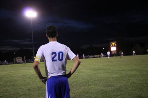 Senior Noah Birchfield waiting on the sideline to be put on the field.