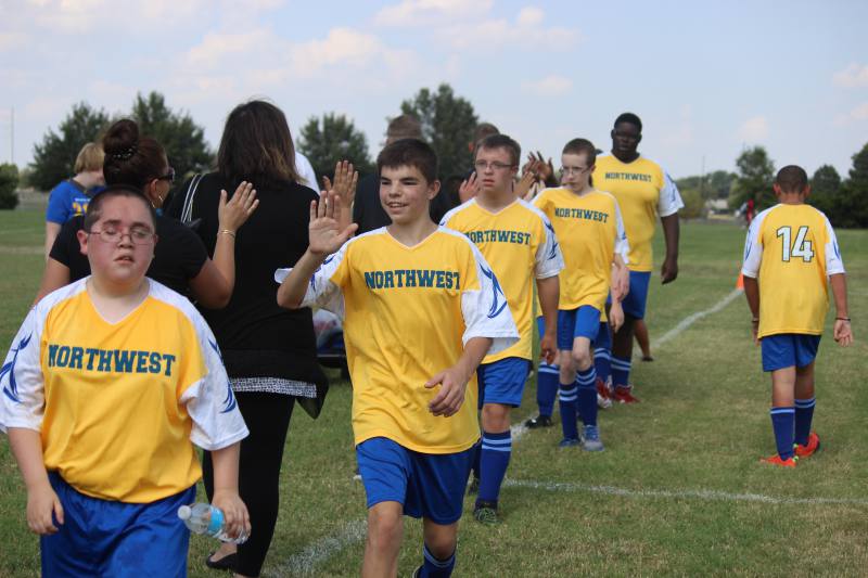 The Bear Buddies team prepares for their game.