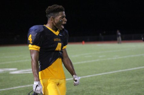 Junior Caleb Belin yelling during the game against Great Bend.