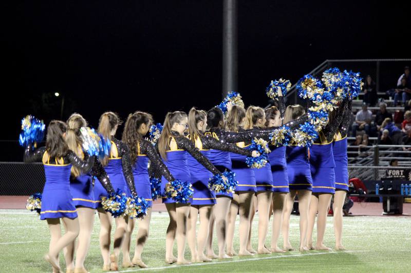 The dance team performs during half time.