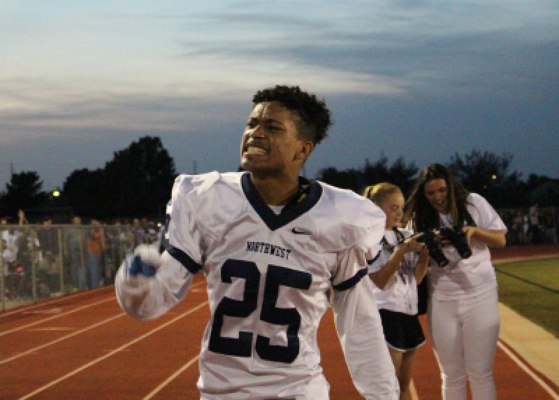 Senior Jorryn Moore celebrates as Northwest makes a touchdown. 