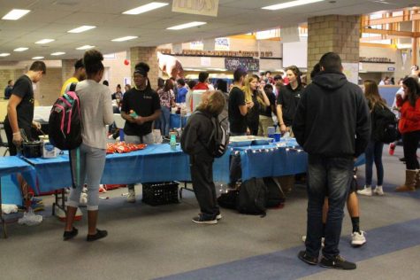 Freshmen Tyler Gates trying to decide what he wants to buy.