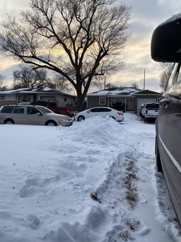 Journalism teacher Susan Holbrooks van sits after new snow fell on her shoveled driveway. The district allowed teachers to teach from home on Feb. 16 and 17 due to wind chills below -10.