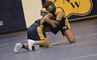 Jayla Downing (10) kneeing Anna Rasynouvong (9). 