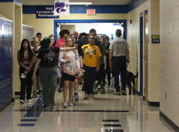 Seniors Josee Hoshaw and Jana Orief lead freshmen on a tour of the school.