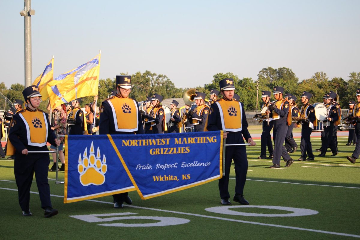 The band takes the field pregame for the National Anthem at the East game on Sept. 12